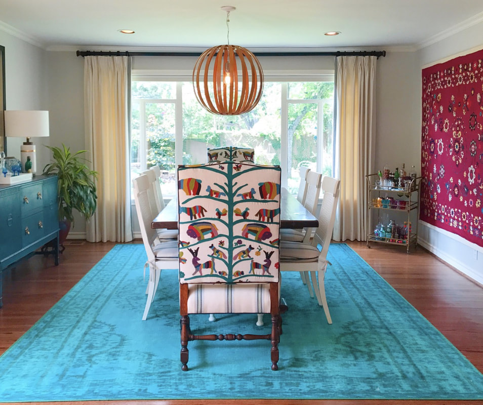 colorful dining room with suzani textile